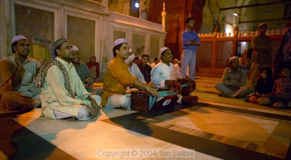 Musicians playing after evening prayers  at the Tomb of Nizammudin, Delhi