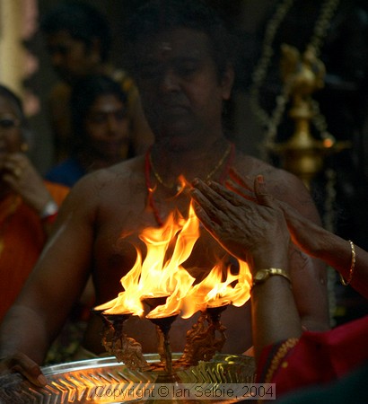 Washing with the sacred flame on the birthday of Lord Ganesha at Sri Senpaga Vinayagar Temple, Ceylon Road, Singapore