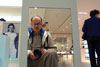 Weird photographer waiting in shoe department of Galleries LaFayette, spring 2002