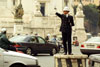 Policeman directing the traffic at Piazza Venezio