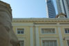 Head of Budha at the Asian Civilizations museum, gazes past the Museum and the buildings of Bank of China and Maybank
