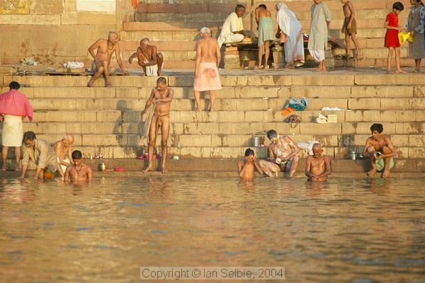 Bathing in the Ganges soon after sunrise, Varanasi