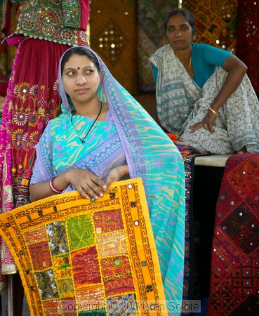 Women selling colourful textiles near the Tibetan Market, Delhi