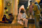 Worshippers and officials after evening prayers  at the Tomb of Nizammudin, Delhi