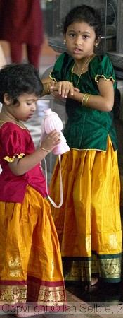 Brightly dressed little girls at celebration of the Depavali Festival at Sri Senpaga Vinayagar Temple, Ceylon Road, Singapore