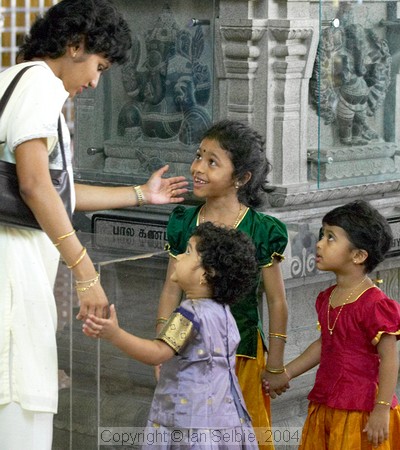 Little girls and their mother at celebration of the Depavali Festival at Sri Senpaga Vinayagar Temple, Ceylon Road, Singapore