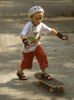 Boy skateboarding in Singapore Botanical Gardens