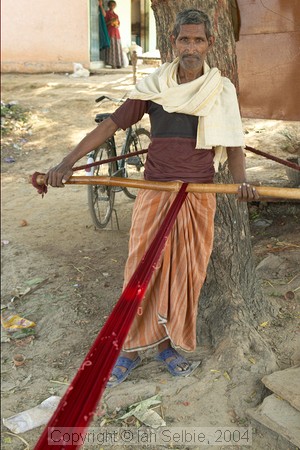 In the countryside near Varanasi: freshly dried silk thread stretching in the sun to dry